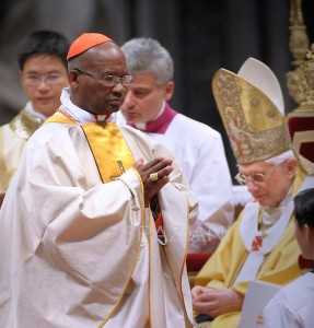 Pope Benedict XVI gives his cardinal ring to Cardinal Medardo Joseph Mazombwe.jpg