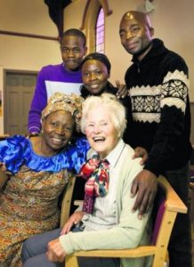 Rosemary Mumbi, front left, with her former teacher Wyn Cornish. Back row, Mike Mwanza, Hellen Cheelo and Chrispin Balashi 