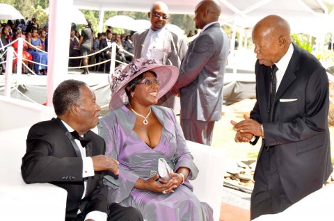 President Sata and First Lady Dr Christine Kaseba speaks with former Botswana president Sir Ketumile Masire during the wedding ceremony of Bona Mugabe (second from right)