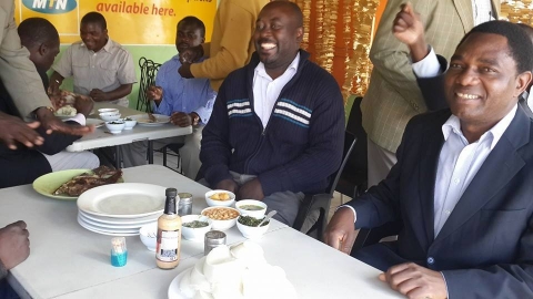 HH , 30th July 2014, at Thornpark market (ku Chusi) having lunch with the people