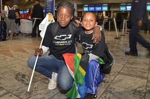 Nokuthula (left) and Mfanelo at OR Tambo International airport moments before taking off to the United Kingdom.