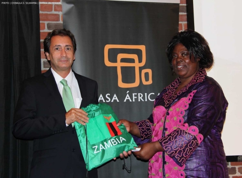 Minister of Tourism and Arts Jean Kapata giving a Zambia’s Golden Jubilee souvenir to Spain's Casa África General-Director Luis Padrón (left) on 8-Sept-2014 in New York. PHOTO | Chibaula D. Silwamba | Zambia UN Mission