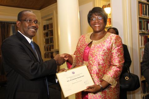 5. First Lady Dr Christine Kaseba with the International Telecommunication Union Secretary General Dr Hamadoun Toure at Yale Club Library where she was inaugurated as the ITU special Envoy for e-Health