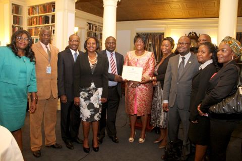 9. First Lady Dr Christine Kaseba with the International Telecommunication Union Secretary General Dr Hamadoun Toure and Zambian leaders at Yale Club Library where she was inaugurated as the ITU special Envoy for e-Health.