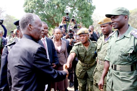 President Sata greets police officers on arrival at the National Assembly of Zambia for the opening of parliament on September 19, 2014 -Picture by THOMAS NSAMA