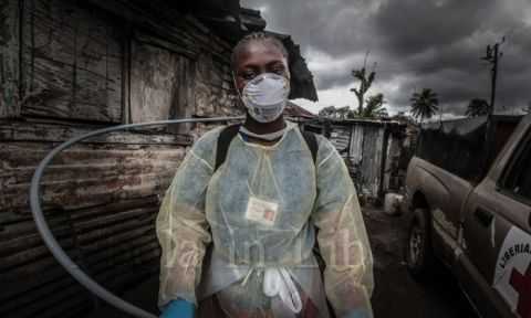 A Red Cross burial team Photograph- Marcus DiPaola:NurPhoto:Rex - Ebola crisis in Liberia
