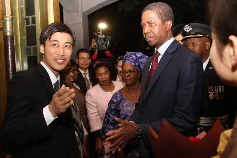 President Edgar Lungu and First Lady Esther Lungu listens to Hong Qiao State Guest House's manager of building number two Ivan Lu on arrival at the State Guest House in Shanghai, China