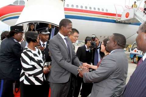 President Edgar Lungu greets Foreign affairs minister Harry Kalaba on arrival at Sanya Phoenix International Airport for Boao forum in Hainan Province of China on March 27,2015 -Picture by THOMAS NSAMA