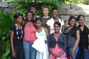 Violet Phiri (in white dress, fourth from right) with her family, including sister Zilose Lyons (second from left), brother-in-law Andy Lyons and sister Tamara Banda (second from right) in Lusaka, Zambia, in 2008.