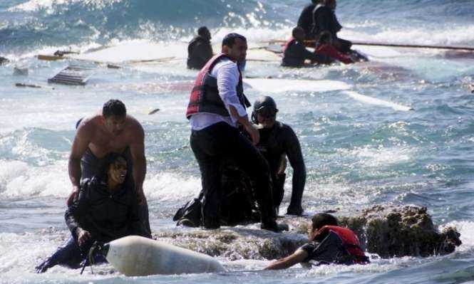Migrants trying to reach Greece are rescued by members of the Greek coastguard and locals just off the island of Rhodes. Photograph- Eurokinissi:Reuters