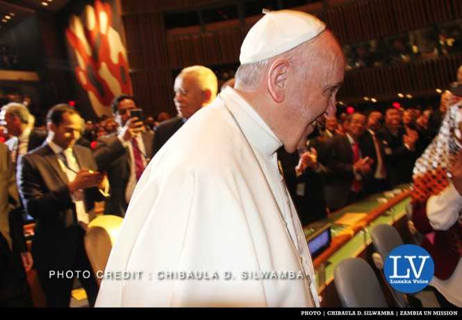 Pope Francis walks past the Zambia seat in the United Nations General Assembly Hall in New York, USA on Friday 25 September, 2015. PHOTO | CHIBAULA D. SILWAMBA | ZAMBIA UN MISSION 