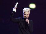 Emeli Sande collects the Best British Female award on stage during the 2013 Brit Awards at the O2 Arena, London. collects the Best British Female award on stage during the 2013 Brit Awards at the O2 Arena, London. PRESS ASSOCIATION Photo. Picture date: Wednesday February 20, 2013. Photo credit should read: Yui Mok/PA Wire