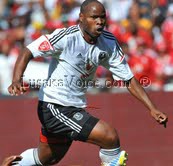 Collins Mbesuma dribbles