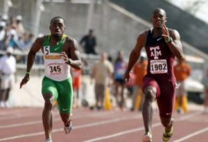 (2011) Texas A&M’s Gerald Phiri, right, and Baylor’s Woodrow Randall compete in the 100-meter dash at the Texas Relays Saturday in Austin, Texas. Phiri won in a meet-record time of 10.06 seconds
