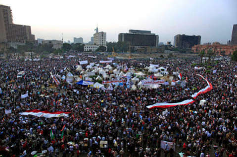 Protesters fill Tahrir as Egypt's President Morsi earlier in July