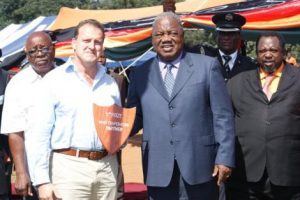 Mr Daniel Munkombwe (Southern Province Minister); Christopher Tett (Managing Director Bushtracks Africa Limited) with the award that was presented by His Excellency Mr RB Banda, The President of The Republic of Zambia; Honourable Austin Liato, Minister of Labour and Social Security (RIGHT)