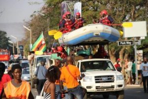 People celebrating in stlyle the hosting of UNWTO General Assembly through street carnival along Livingstone way in Victoria Falls