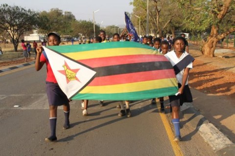 Victoria falls boy scouts and girl guides during a street carnival along Livingstone way in Victoria Falls