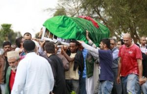 Kenya buries its dead amid search for bodies and clues