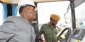 DRIVING THE COUNTRY FORWARD- President Sata goes behind the wheel of an earth-moving equipment during the launch of the 45.5km Chingola-Kitwe dual carriage way in Kitwe yesterday. – Picture by EDDIE MWANALEZA