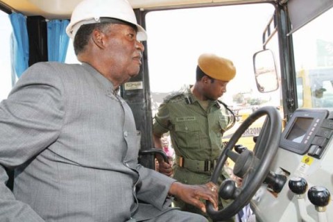 DRIVING THE COUNTRY FORWARD- President Sata goes behind the wheel of an earth-moving equipment during the launch of the 45.5km Chingola-Kitwe dual carriage way in Kitwe yesterday. – Picture by EDDIE MWANALEZA DRIVING THE COUNTRY FORWARD- President Sata goes behind the wheel of an earth-moving equipment during the launch of the 45.5km Chingola-Kitwe dual carriage way in Kitwe yesterday. – Picture by EDDIE MWANALEZA