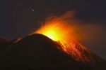 Etna volcano erupts, lighting up sky over Sicily. Etna erupts occasionally. Its last major eruption occurred in 1992
