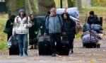 HALF a million immigrants have flooded into the UK at a rate of more than 1,300 a day in 12 months, official figures revealed yesterday