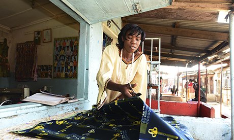 Isabel Kachinda at her tailoring shop in Bwafwano market, which she has built up thanks to business