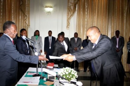 Lawrence Evans President Sata receives the affidavit of Oath from Livingstone member of parliament Lawrence Evans during the Swearing-in ceremony at State House on October 5,2013 -Picture by THOMAS NSAMA