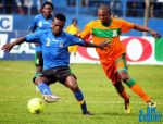 Abubaker of Tanzania Mainland shield the ball from Stanley Shimbi of Zambia