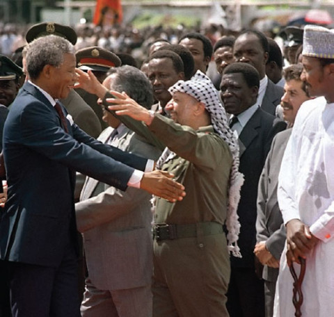 On his first trip to a foreign country after being released from prison, South African anti-apartheid leader and African National Congress (ANC) member Nelson Mandela (l), in Zambia to attend a meeting in Lusaka Feb '90
