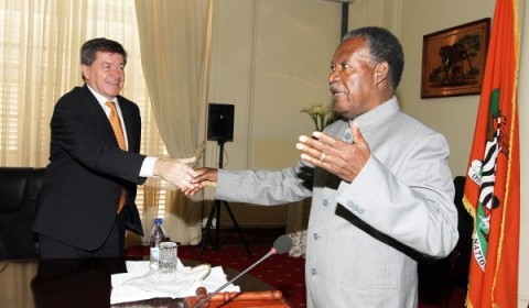 President Michael Sata shake hands with Guy Ryder, Director General Of International Labour Organization (ILO) at State house