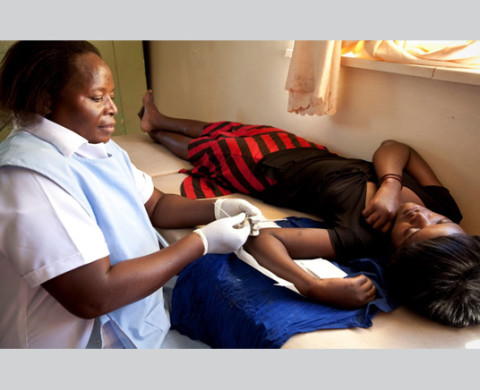 A nurse at a hospital in the Kasama district of northern Zambia prepares to insert a birth control implant A nurse at a hospital in the Kasama district of northern Zambia prepares to insert a birth control implant.