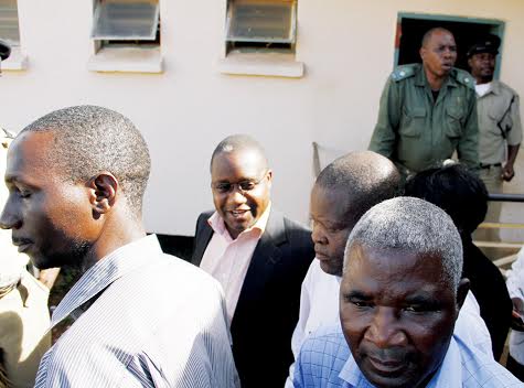 MMD Chisamba member of Parliament Moses Muteteka (background) is led to a waiting vehicle after he was sentenced to five years in prison with hard labour yesterday. – Picture by MACKSON WASAMUNU MMD Chisamba member of Parliament Moses Muteteka (background) is led to a waiting vehicle after he was sentenced to five years in prison with hard labour yesterday. – Picture by MACKSON WASAMUNU