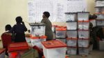 2011, Election volunteers stand by ballot boxes stored at the Civic Center in Lusaka, Zambia.jpg