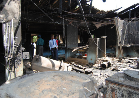 A PUPIL looks at the remains of the kitchen gutted by fire at Choma Secondary School yesterday. – Picture By CHOMBA MUSIKA.jpg