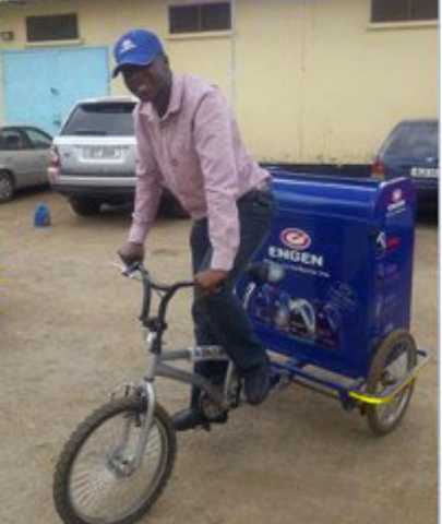 A bicycle vendor sells Engen products directly to taxi and bus drivers in Lusaka, Zambia.