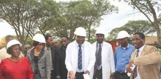DEPUTY Health Minister Chitalu Chilufya (middle) unveiling the foundation for the construction of the first district hosiptal in Kazungula. – Picture by NANCY MWAPE.