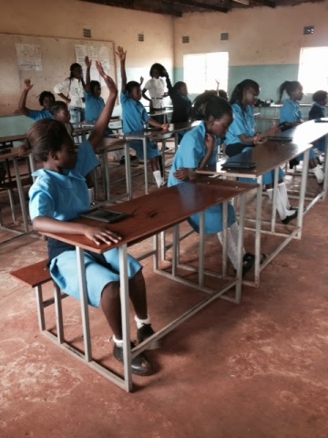 Mpika Grade 5 girls learning to use the tablets