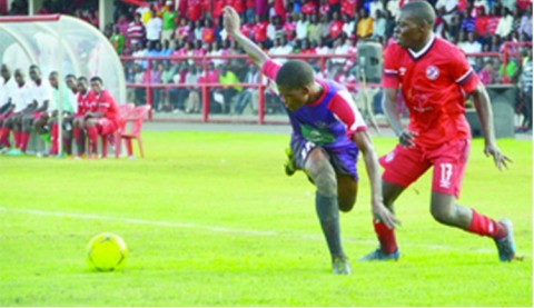 NKANA midfielder, Kelvin Mubanga (right) battles for the ball with Njabulo Ndlovu of Swaziland’s Mbabane Swallows