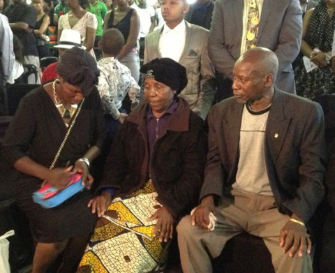 On the front row: Late Dennis Lota's father and mother, and his sister Rose during the burial Church service