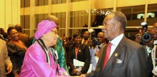 Sata Exchanging greetings with Liberian Leader Ellen Johnson Sirleaf during the closing ceremony — in Addis Ababa, Ethiopia