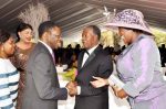 Equatorial Guinea President Teodoro Obiang Nguema Mbasogo (l) greeets President Sata as First Lady Dr Christine Kaseba looks on during the wedding ceremony of Bona Mugabe (second from right),