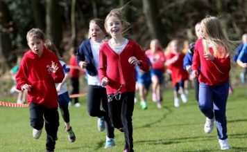 FUN RUN: Children taking part in the event at Maiden Castle