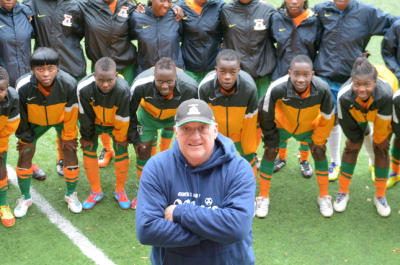 Geoffrey Levy stands with the Zambia womens u-17 national soccer team on Monday, Mar. 3, 2014, in San Rafael, Calif. He is helping the girls, age 14-17, achieve a spot in the World Cup games. (Frankie Frost/Marin Independent Journal) Frankie Frost