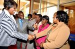 Junior Achievement Zambia Executive Director Teddy Nyansulu introduces Agriculturalist Tamara Kambikambi (r) to First Lady Dr Christine Kaseba Sata when she arrived at Mulungushi International Conference Centre