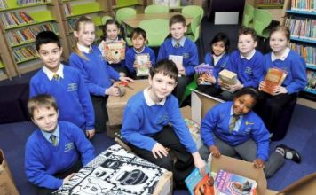 Pupils at St Stephen and All Martyrs’ School packing books for their partner school in Zambia