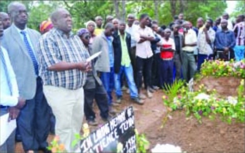 COPPERBELT Province Minister Mwenya Musenge addresses mourners at Milemu Cemetery in Luanshya during the burial of three teachers and a bus conductor. Picture by CHATULA KAMPO