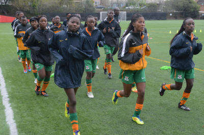 The Zambia womens u-17 national soccer team runs laps at practice on Monday, Mar. 3, 2014, in San Rafael, Calif. Geoffrey Levy is helping the girls, age 14-17, achieve a spot in the World Cup games. (Frankie Frost/Marin Independent Journal) Frankie Frost