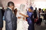 Zimbabwean President Robert Mugabe and First Lady Grace Mugabe during the wedding ceremony of their daughter Bona Mugabe and her husband Simba